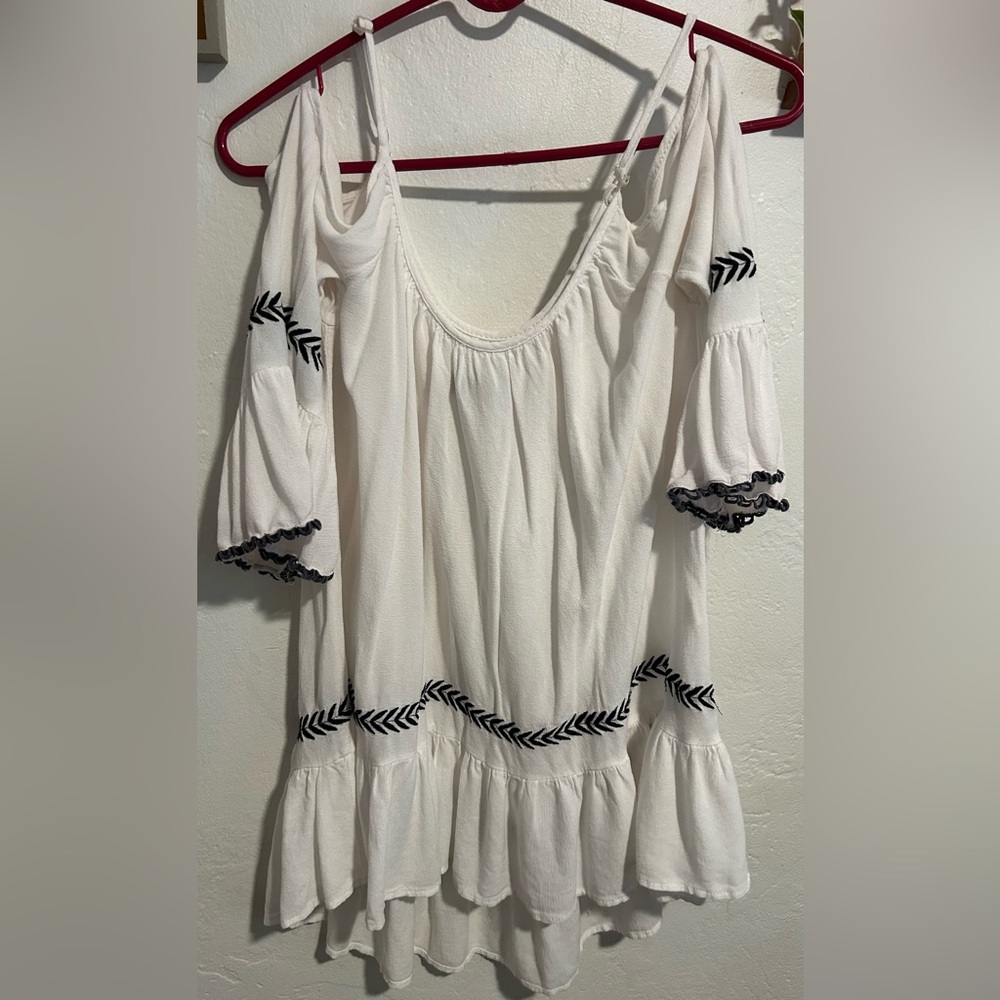 Elegant Off-Shoulder White Blouse with Black Detailing